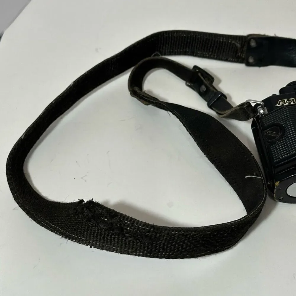 Vintage Canon A-1 Black 35 mm SLR with Strap/ Body Only